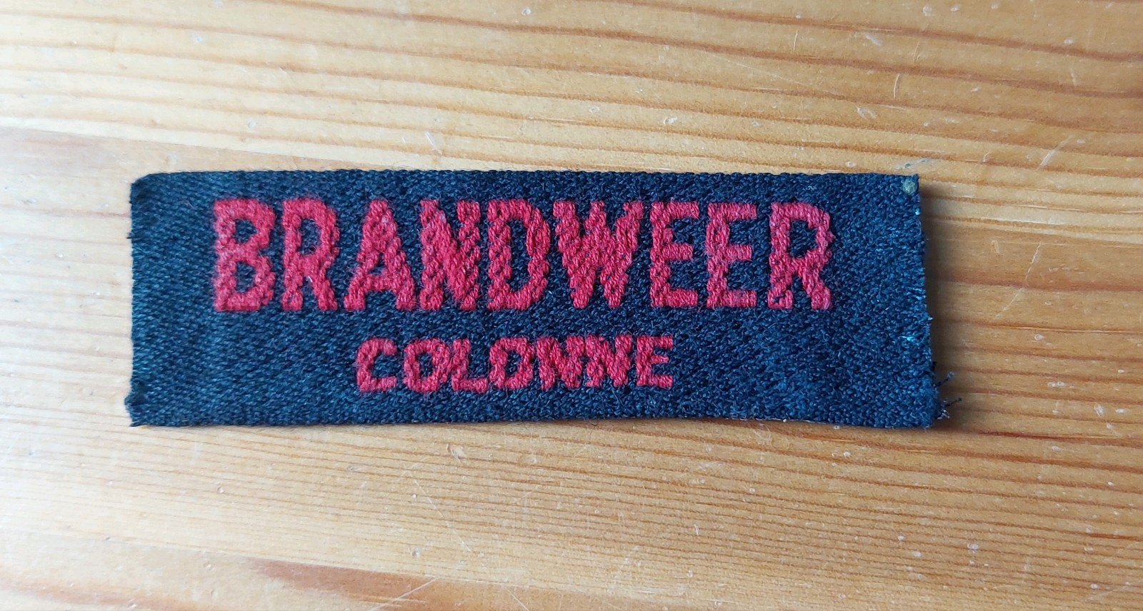 Naamlint Brandweer Colonne, Verzamelen, Ophalen of Verzenden, Landmacht, Nederland, Embleem of Badge