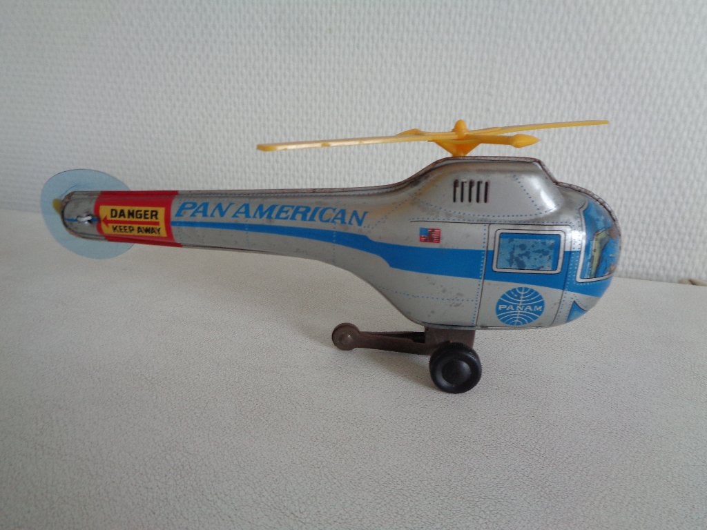 Helicopter van blik. Made Japan.  22 cm lang.  PAN AMERICAN, Ophalen of Verzenden