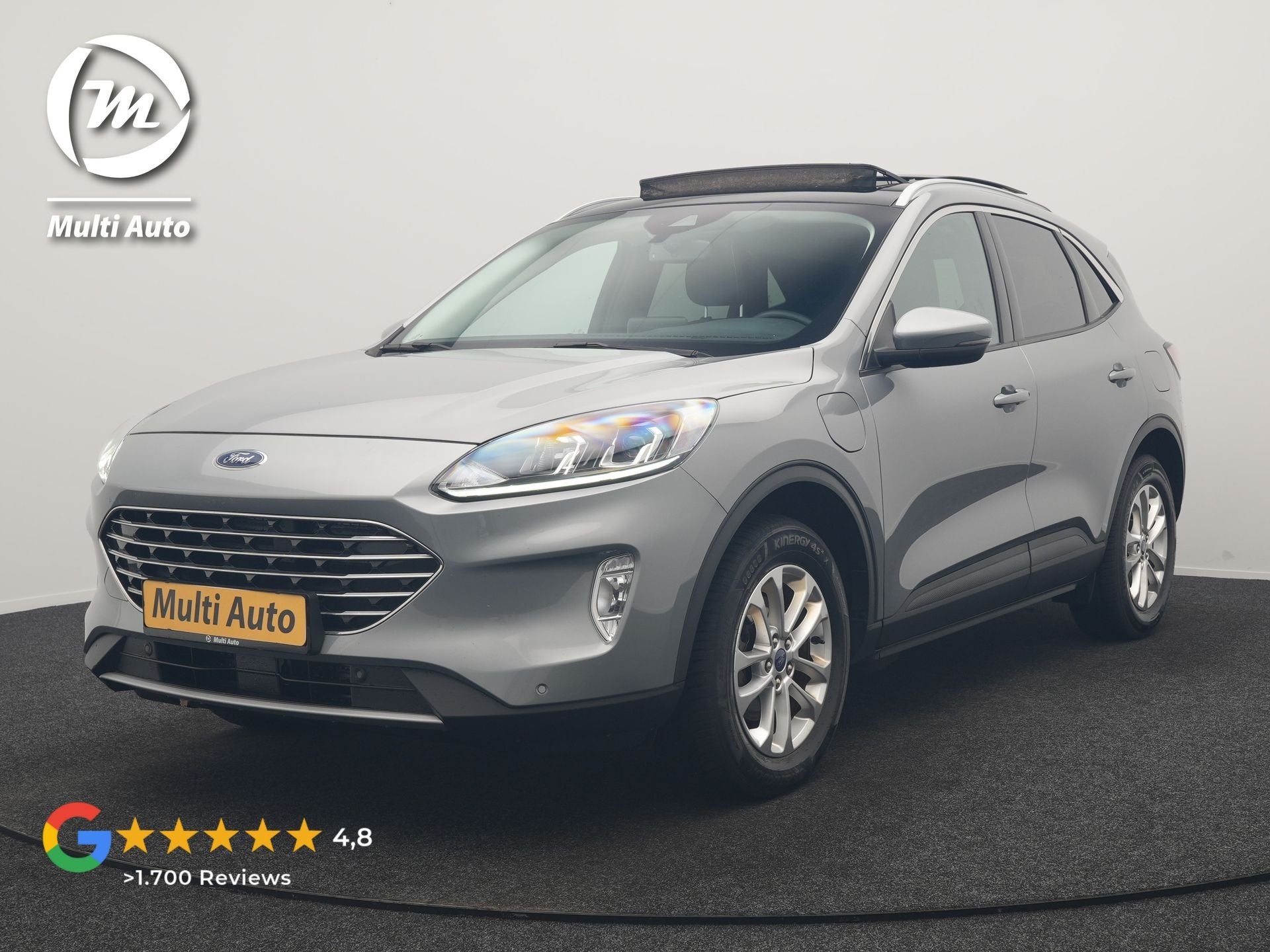 Ford Kuga 2.5 PHEV Titanium 225pk Dealer O.H. | Trekhaak Afn, Auto's, Dealer onderhouden, Gebruikt, Zwart, 4 cilinders