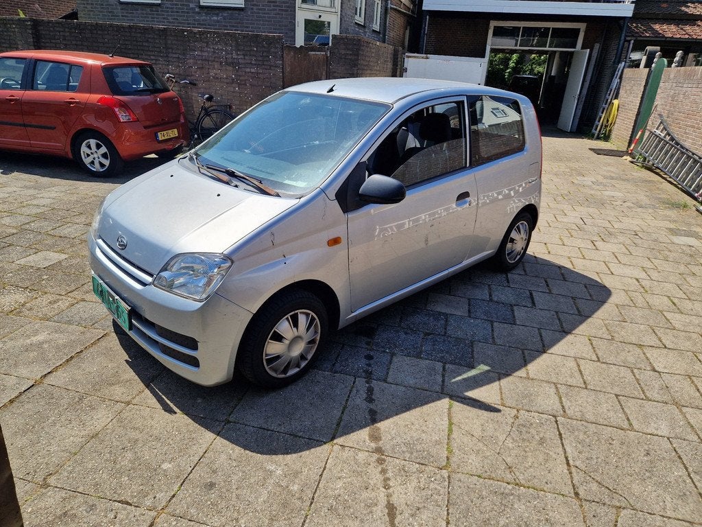 Daihatsu Cuore 1.0-12V Azure airco, Auto's, Daihatsu, 18 €/maand, 4 stoelen, Cuore, Origineel Nederlands