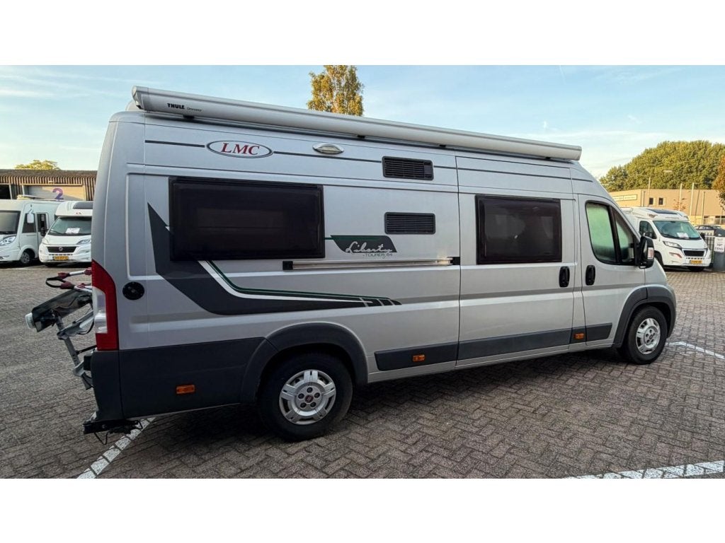 LMC Liberty 64 TOURER Lengte Bedden slechts 53.000 Km (NAP ), Caravans en Kamperen, Buscamper of Camperbus, Tot en met 2, Bedrijf