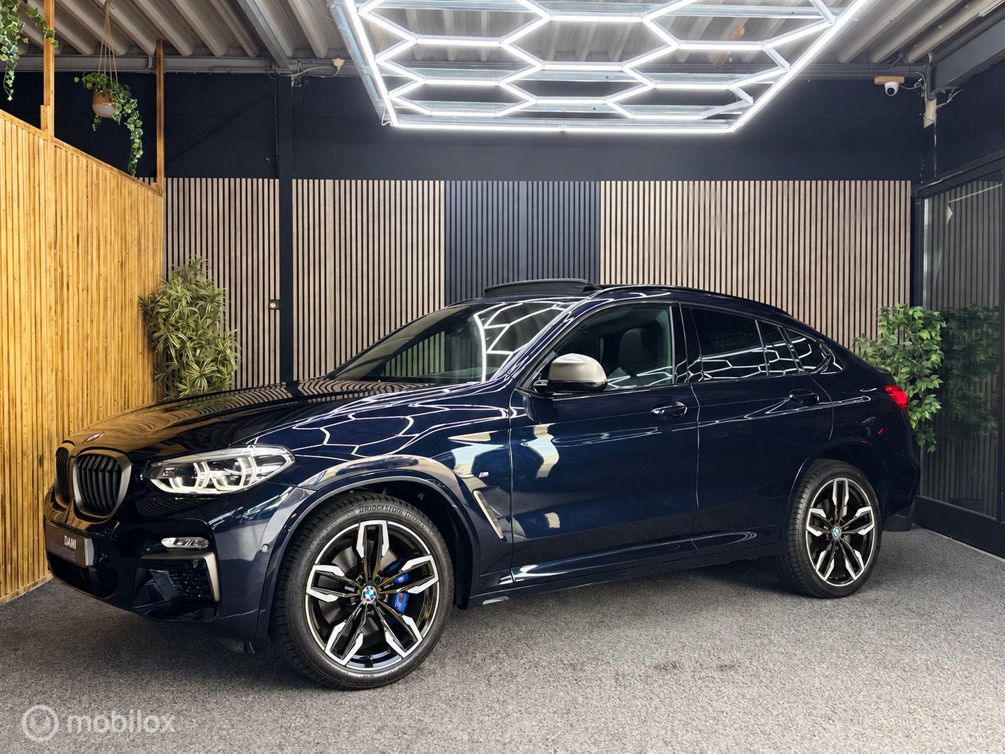 BMW X4 M40i High Executive|Pano|Led|Navi|Hud|Carplay|Acc|Cam, Auto's, Automaat, Gebruikt, Zwart, Blauw