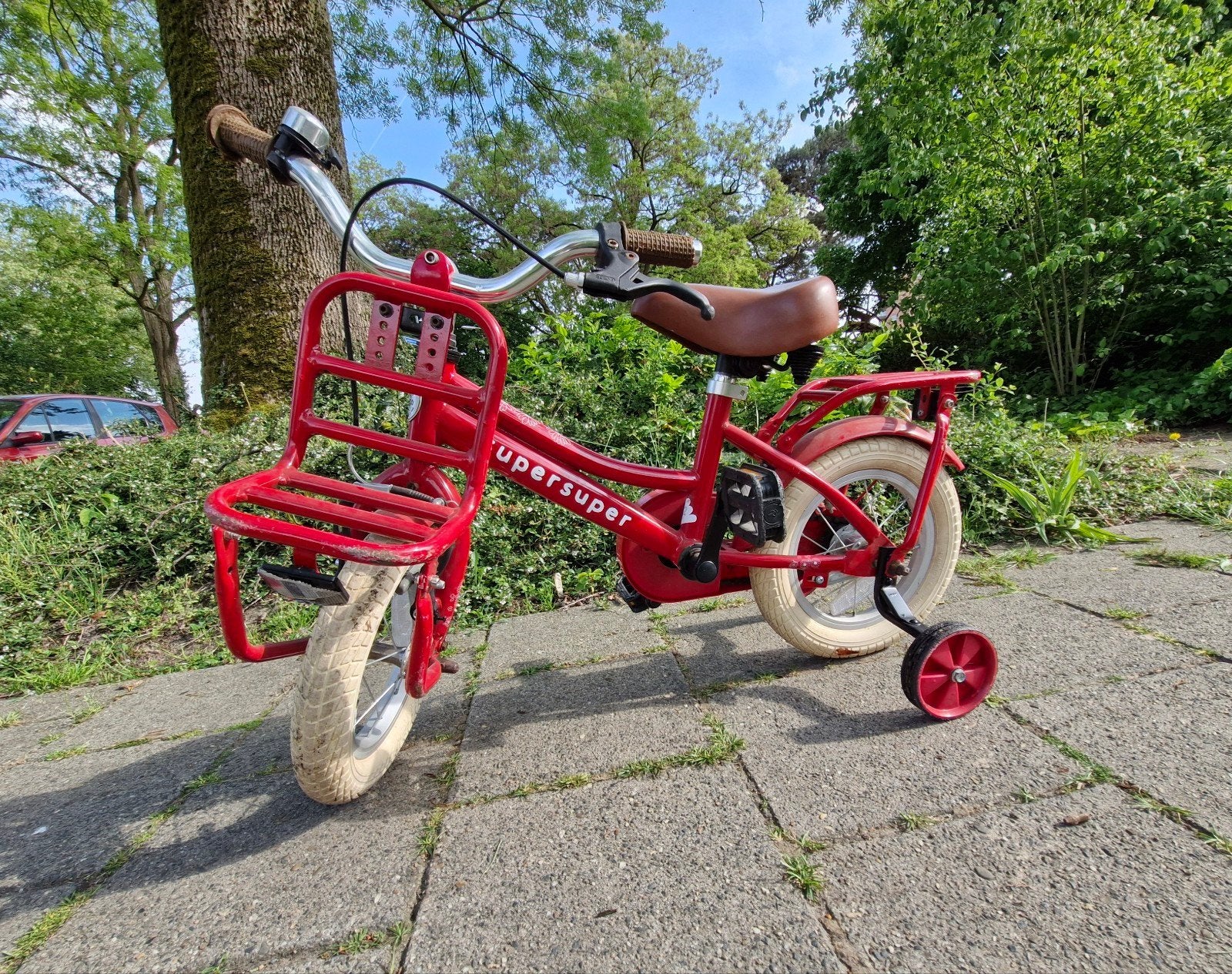 SuperSuper Kinderfiets Rood 12 met Zijwieltjes en Voordrager, Zijwieltjes, Gebruikt, Ophalen of Verzenden, Minder dan 16 inch