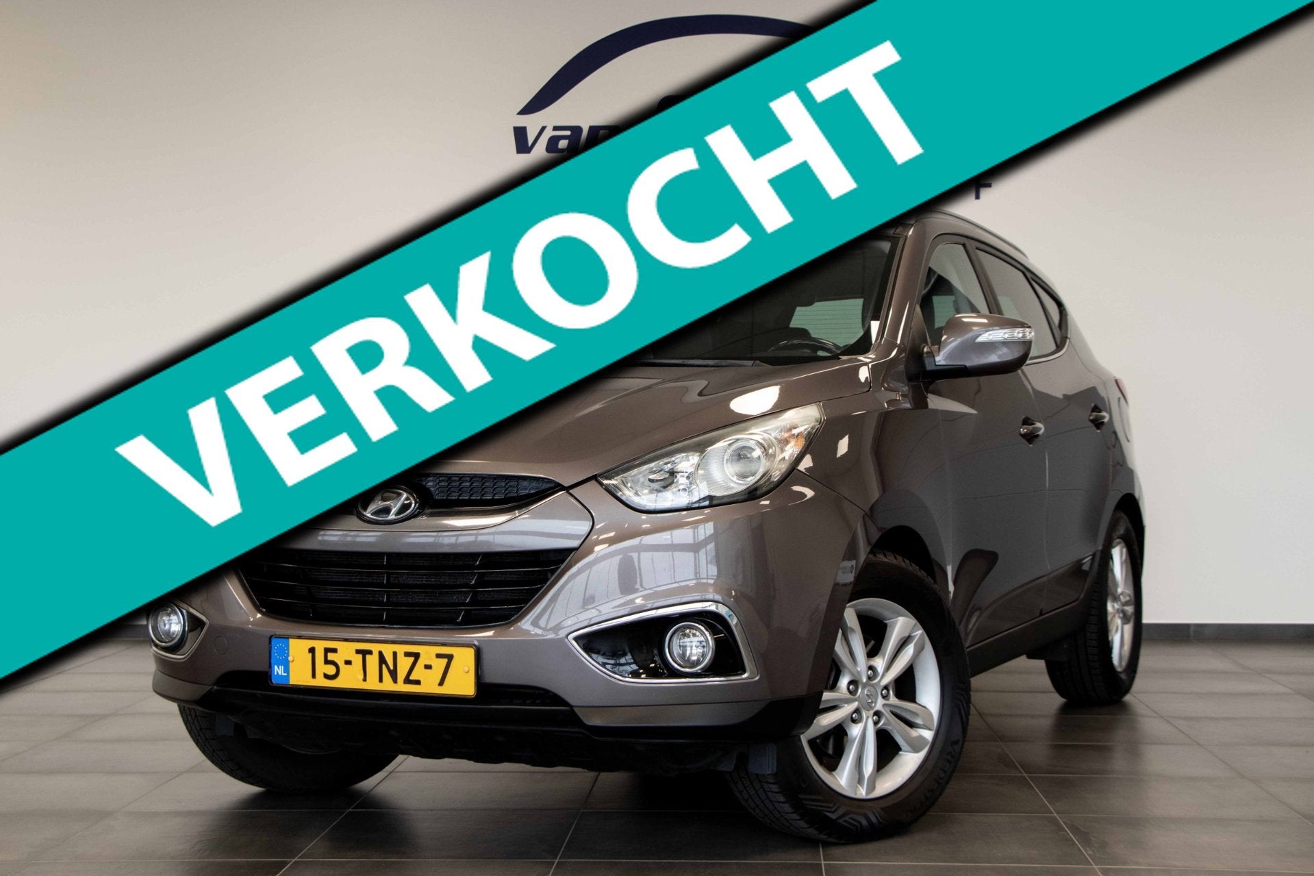 Hyundai Ix35 2.0i Business Edition | Automaat | Navigatie |, Auto's, Gebruikt, Zwart, 4 cilinders, Bruin