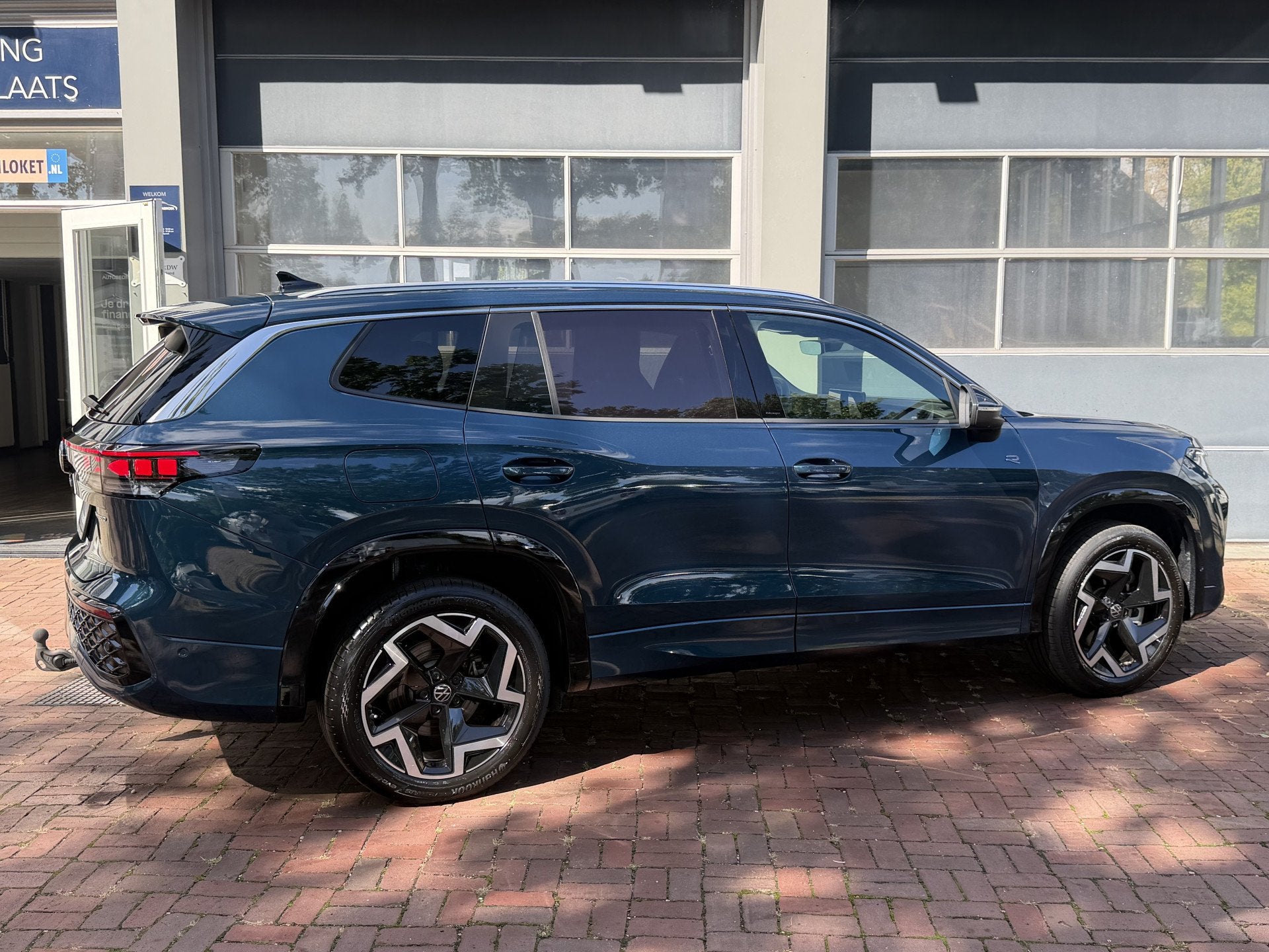 Volkswagen Tayron 1.5 eHybrid plug-hybride R-Line Edition 20, Auto's, Dealer onderhouden, 4 cilinders, Blauw, Leder en Stof