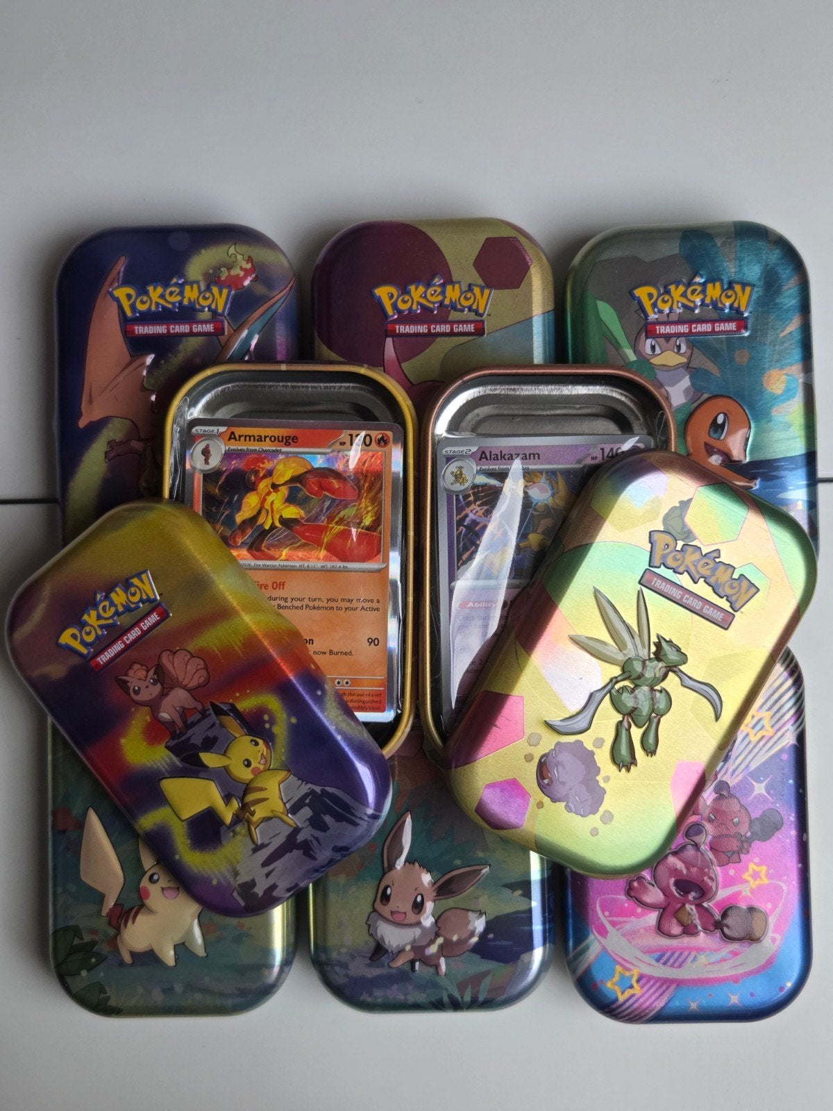 Blikje met Pokemon kaarten, Ophalen of Verzenden, Zo goed als nieuw, Meerdere kaarten, Foil