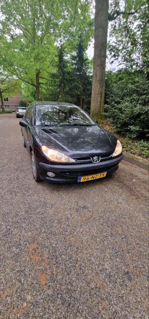 Peugeot 206 1.4 3D 2003 Zwart, Auto's, Voorwielaandrijving, 31 €/maand, 4 cilinders, Zwart