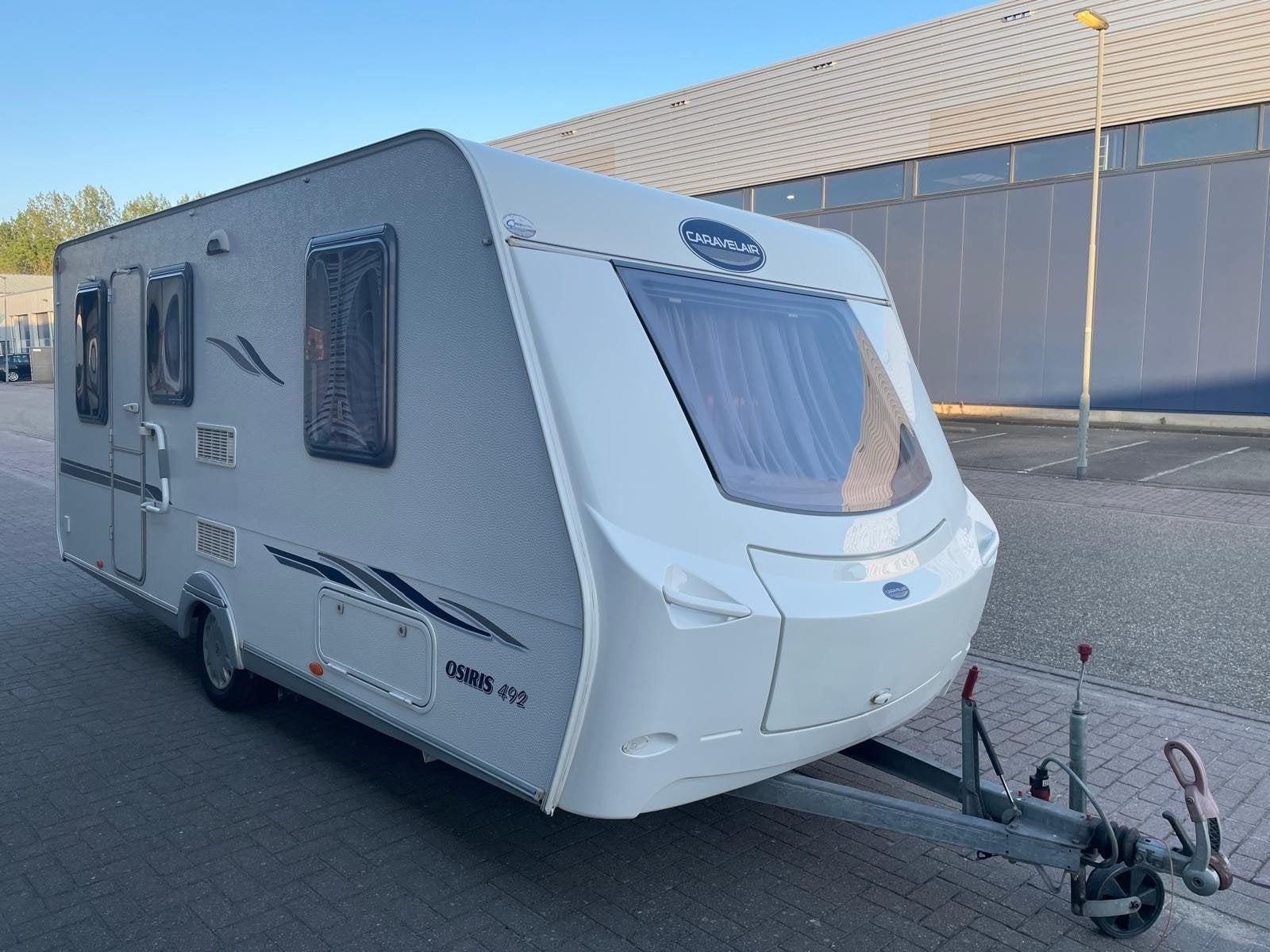 Caravelair osiris 492 met mover en voortent, Treinzit, Kachel, Particulier, 4 tot 5 meter