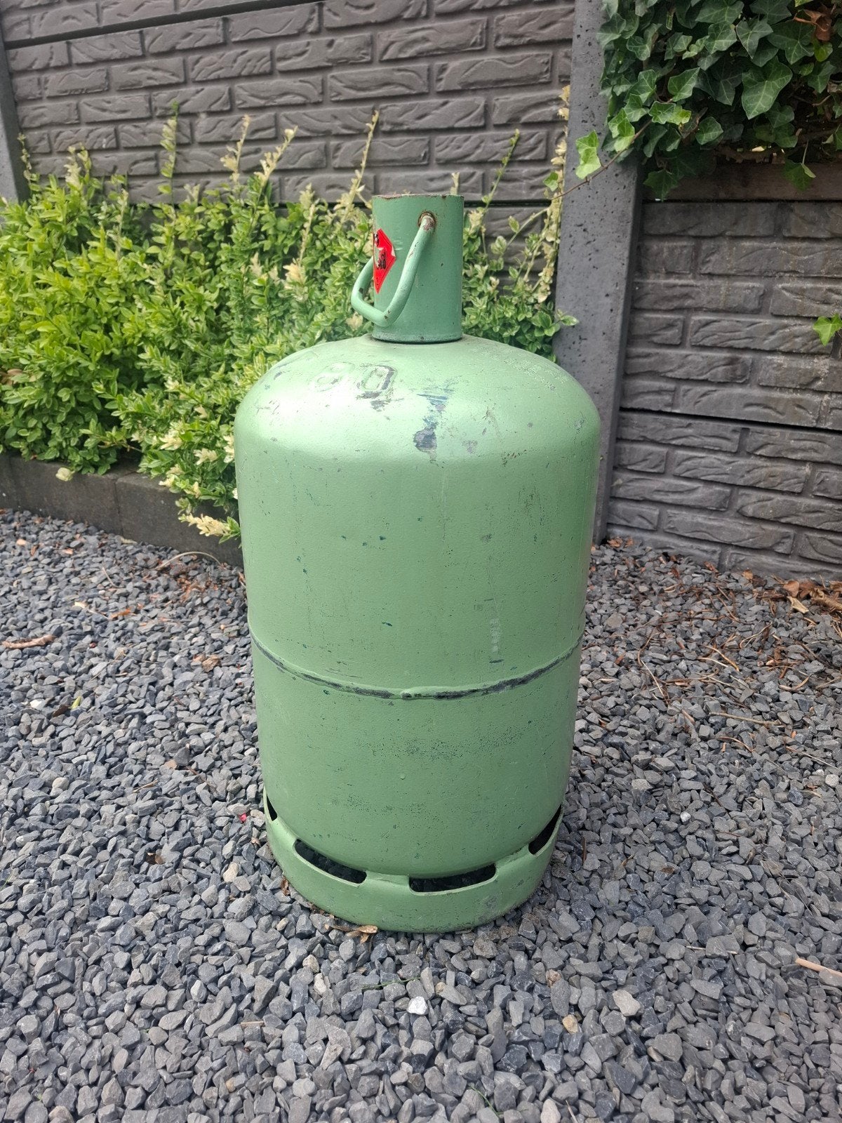 lege gasfles voor buitenhaard of buitenkachel, Ophalen