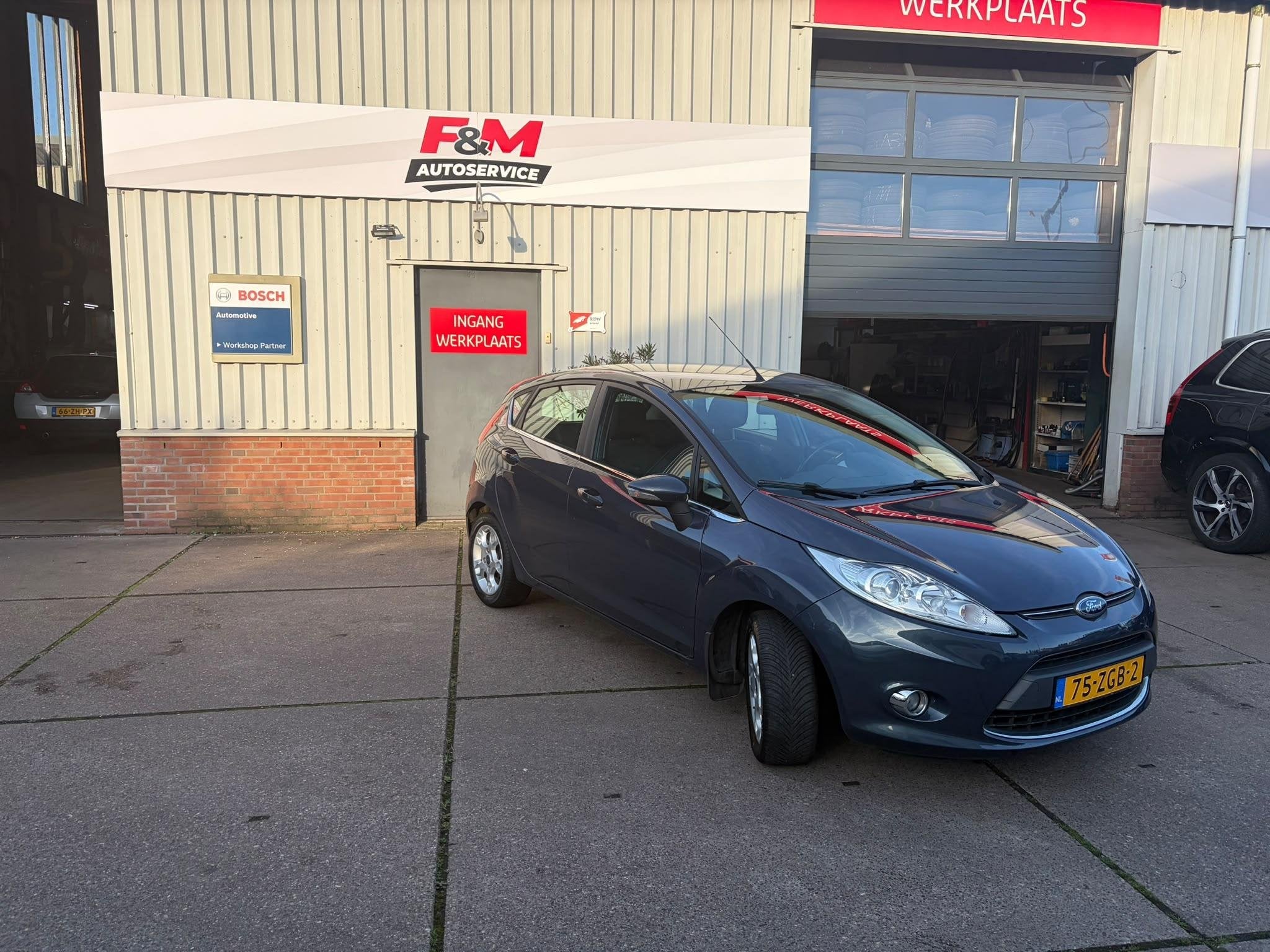 Ford Fiesta 1.25 Titanium Airco, cruise, pdc achter, Voorwielaandrijving, Stof, 1242 cc, 4 cilinders