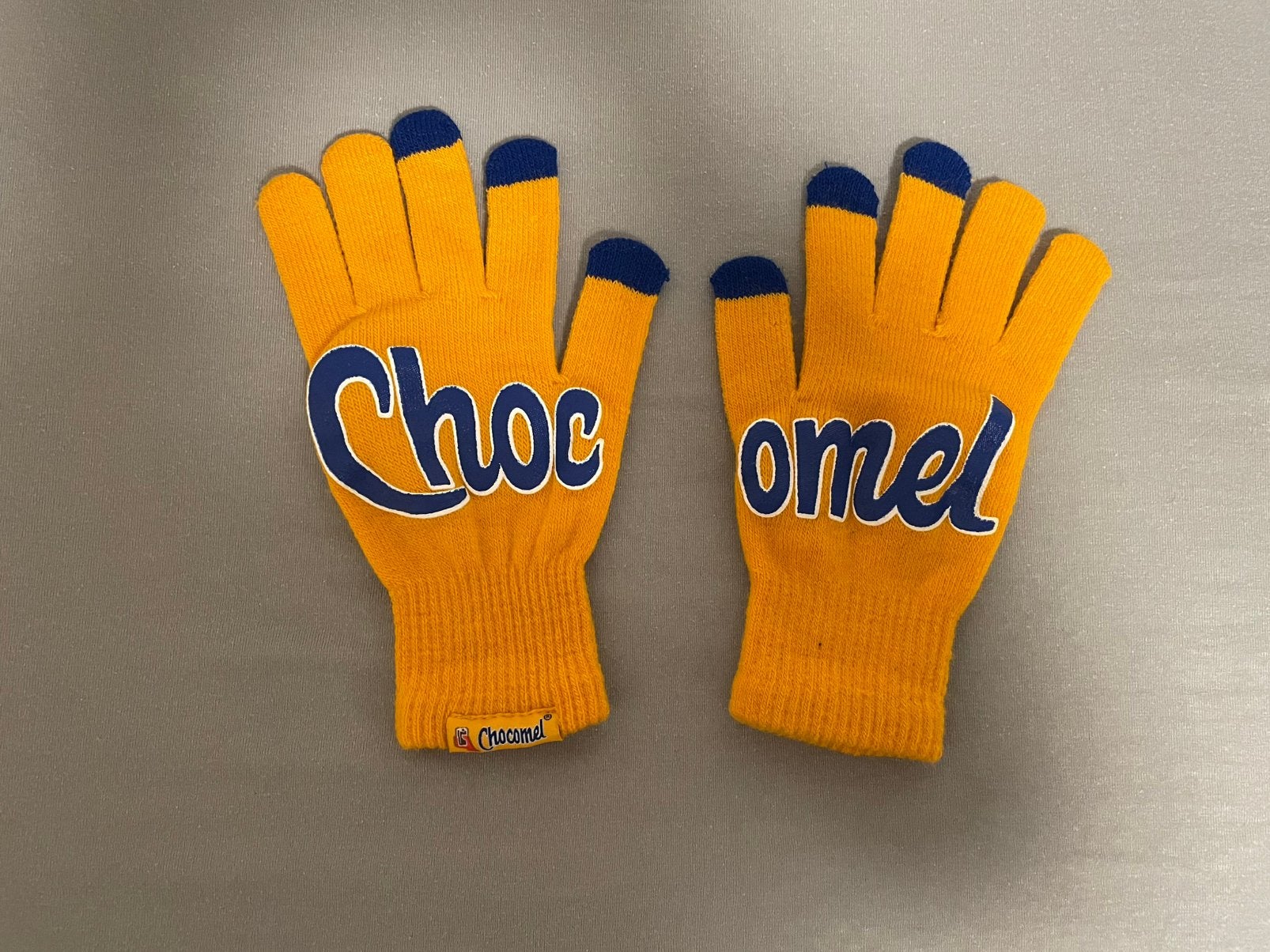 Chocomel handschoenen, Ophalen of Verzenden, Zo goed als nieuw