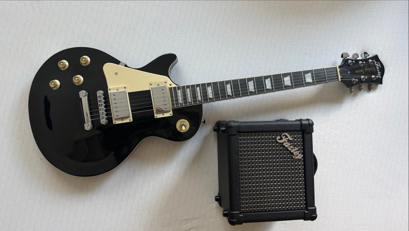 Linkshandige Fazley elektrisch gitaar met Kubo versterker, Overige merken, Gebruikt, Met versterker, Ophalen of Verzenden