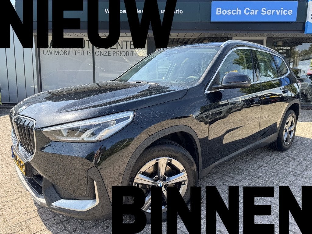 BMW X1 sDrive18i | Navi | Stoel & Stuurverw. | Camera, Auto's, 12 maanden, Gebruikt, Euro 6, Zwart
