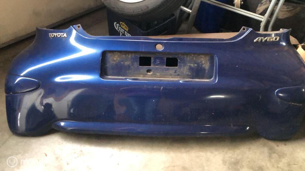 Achterbumper blauw metallic Toyota Aygo I ('05-'14), Auto-onderdelen, Carrosserie en Plaatwerk, Bumper, Toyota, Achter, Gebruikt