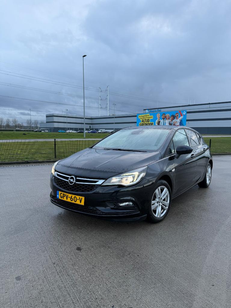 Opel Astra 1.0 Turbo 77KW 5D Easytr 2017, Auto's, Stof, Navigatiesysteem, Zwart, 104 pk