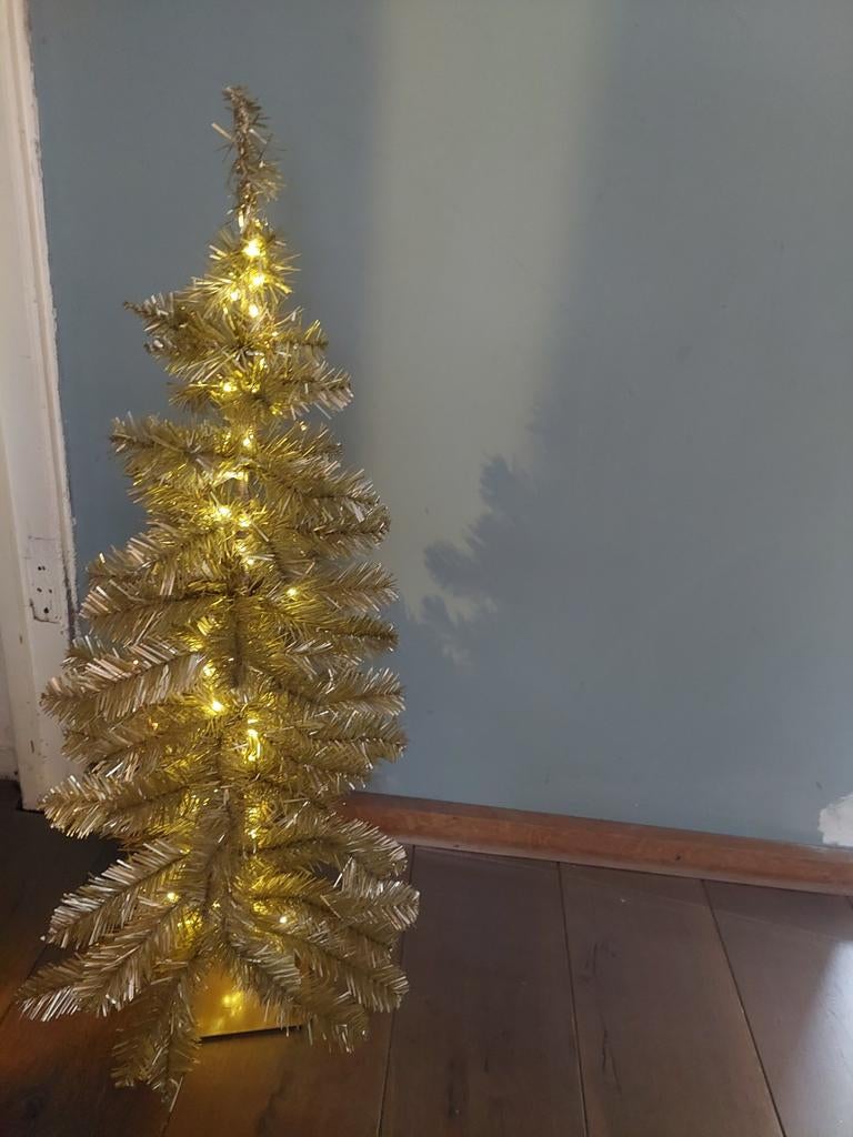 kunst kerstboom, Ophalen