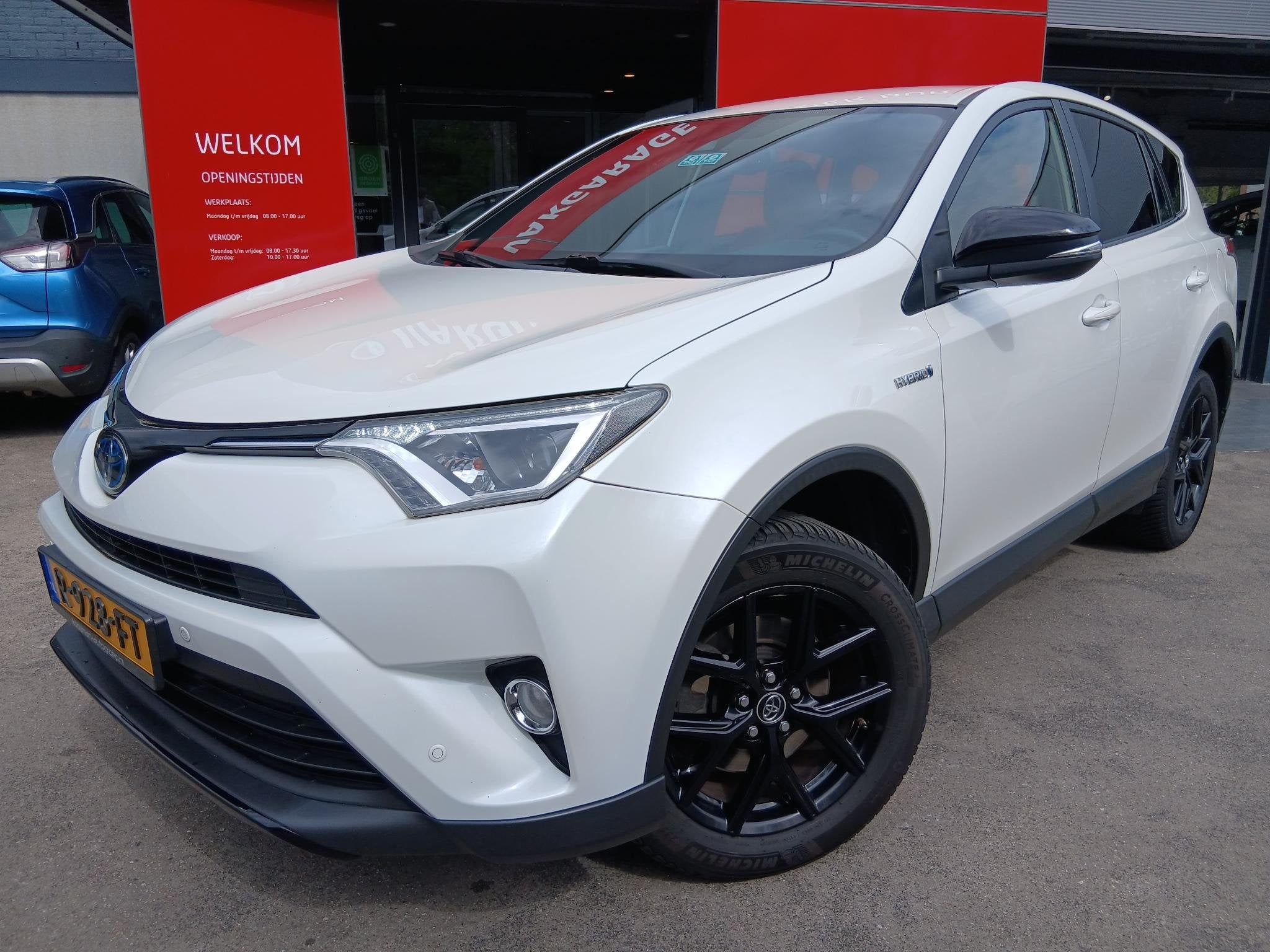 Toyota RAV4 2.5 Hybrid Black Edition, Auto's, Toyota, 12 maanden, Gebruikt, Euro 6, Wit