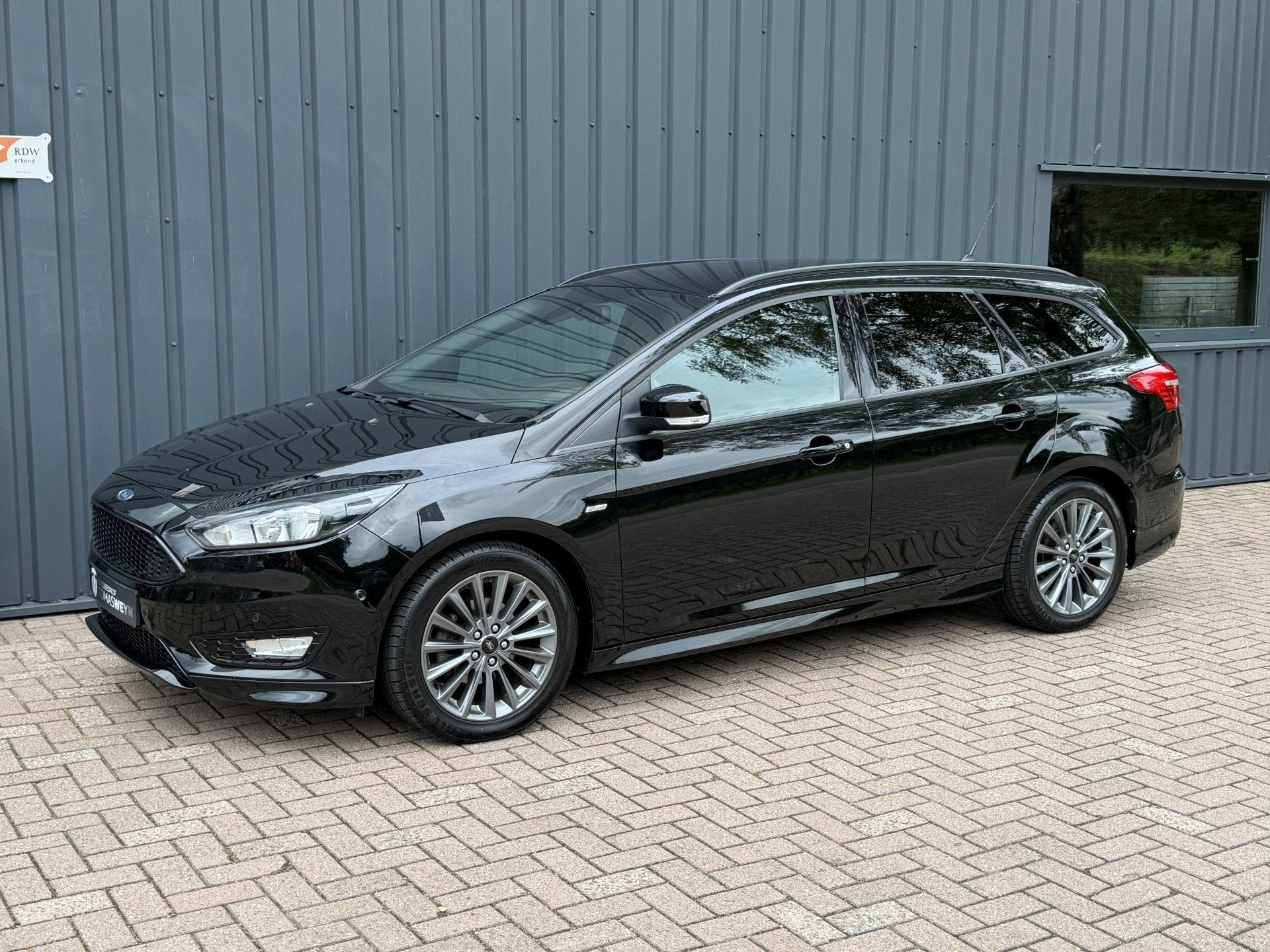 Ford Focus Wagon 1.0 ST-Line NAVIGATIE!/140 PK!/ONDERHOUDEN!, Stof, Gebruikt, Zwart, Zwart