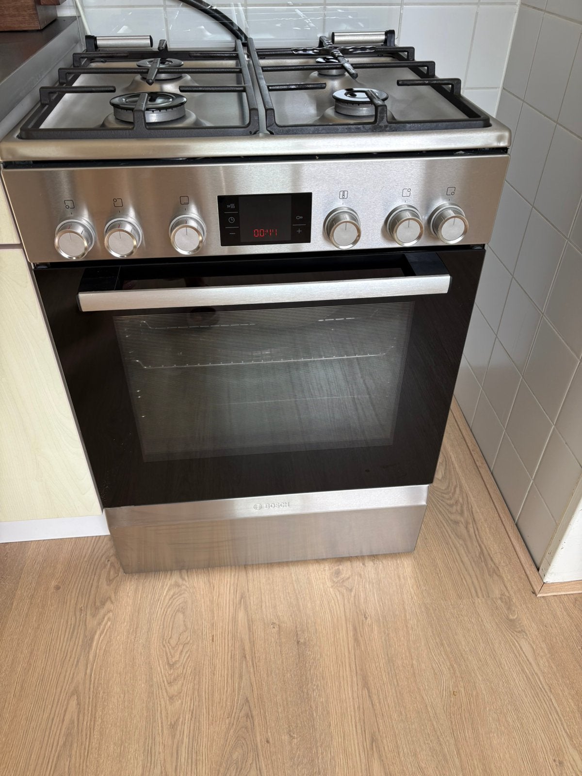 Bosch fornuis, Witgoed en Apparatuur, Fornuizen, Ophalen, 4 kookzones, Zo goed als nieuw, Gas