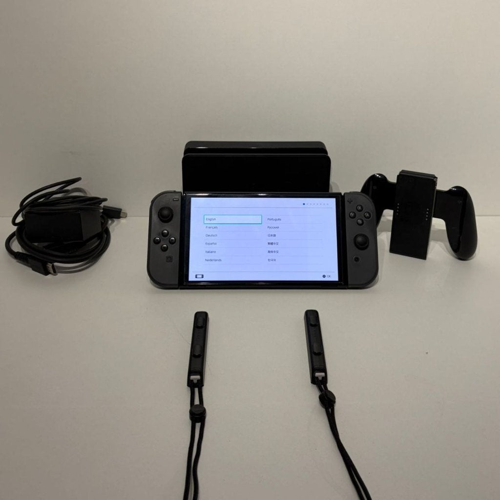 Nintendo Switch OLED Zwart/Grijs Compleet in Nette Staat, Spelcomputers en Games, Ophalen of Verzenden, Zo goed als nieuw, Met 1 controller