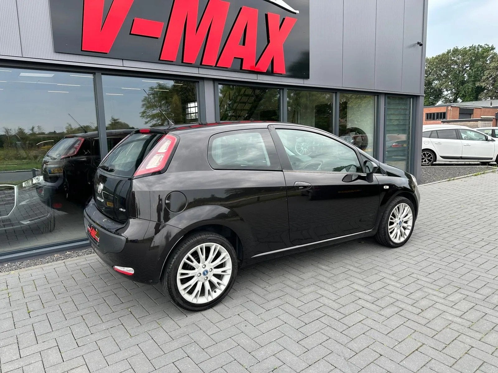 Fiat Punto Evo 1.4 16V 105PK Multiair Dynamic Airco Isofix 1, Auto's, Fiat, Voorwielaandrijving, Euro 5, Stof, Zwart