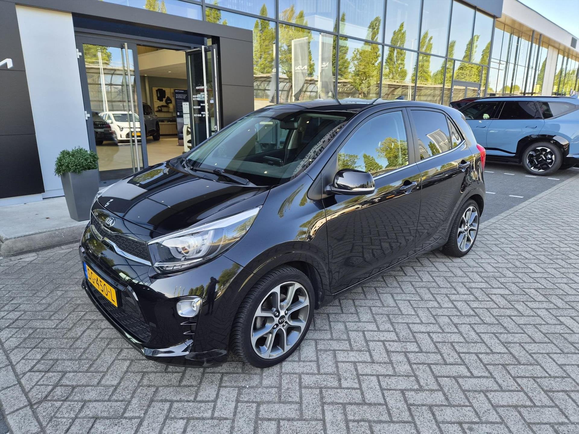 Kia Picanto 1.0 MPi 67pk 4-zits Design Edition Leer/ Navi/ C, Voorwielaandrijving, Gebruikt, 4 stoelen, Zwart