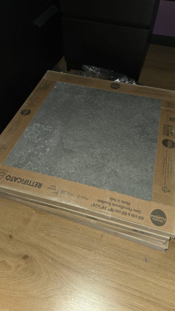 Grijze tegel, Ophalen, 60 cm of meer, Nieuw, Minder dan 5 m²