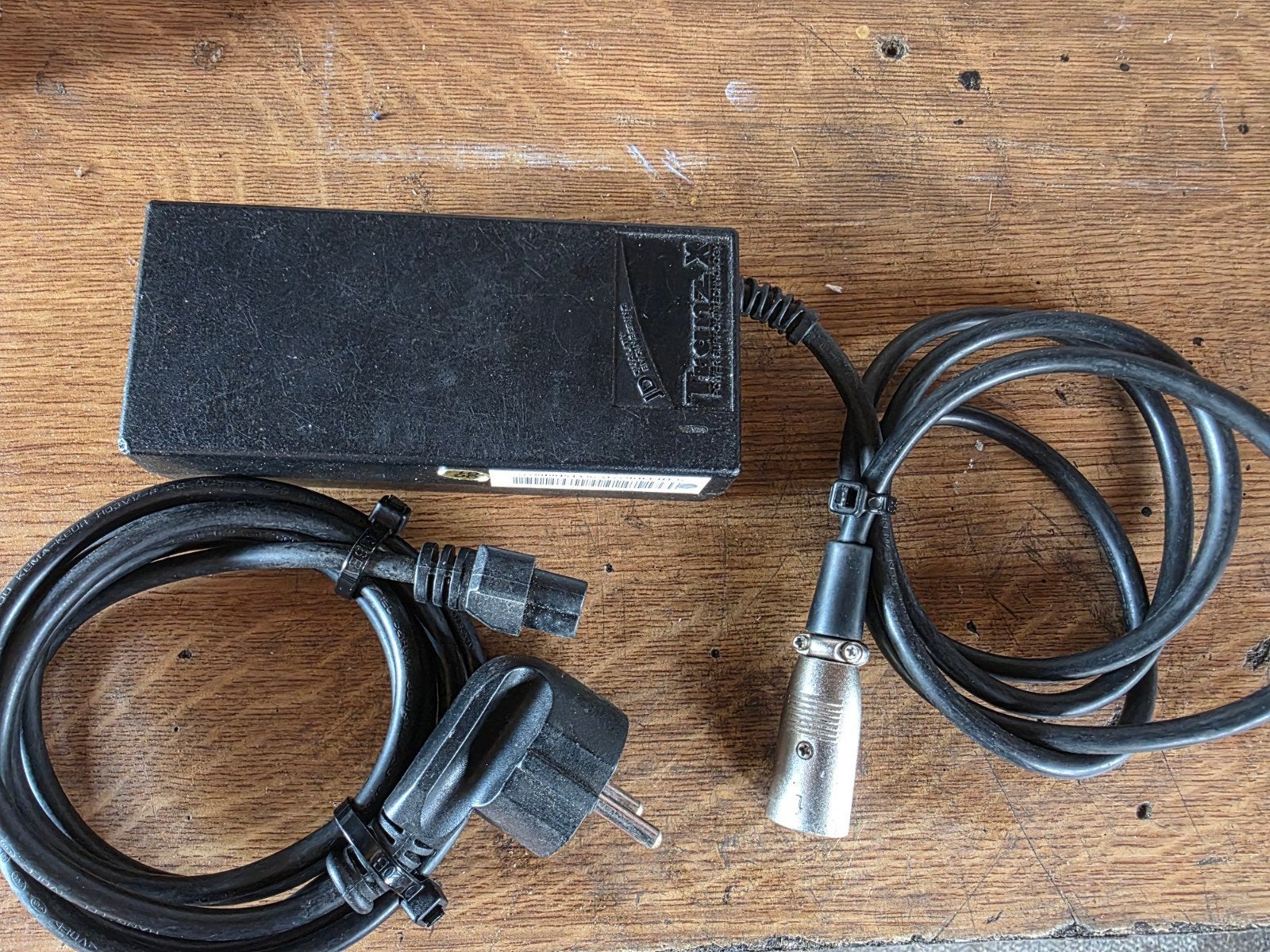 originele Tranzx lader 24V  4pins, Ophalen of Verzenden, Zo goed als nieuw