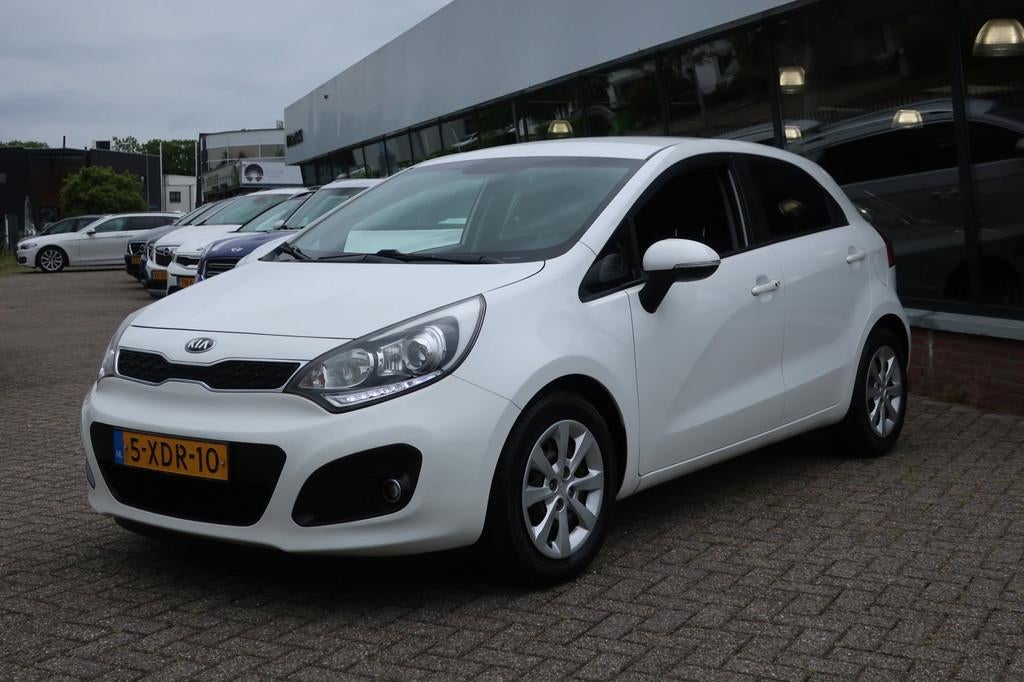 Kia Rio 1.2 CVVT Super Pack 2e EIG_LED_CRUIS_KEYLESS_PDC_CLI, Zwart, 4 cilinders, Wit, Origineel Nederlands