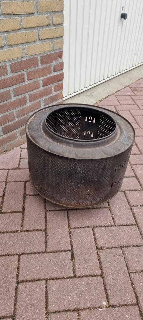 Vuurkorf (wasmachinetrommel), Ophalen