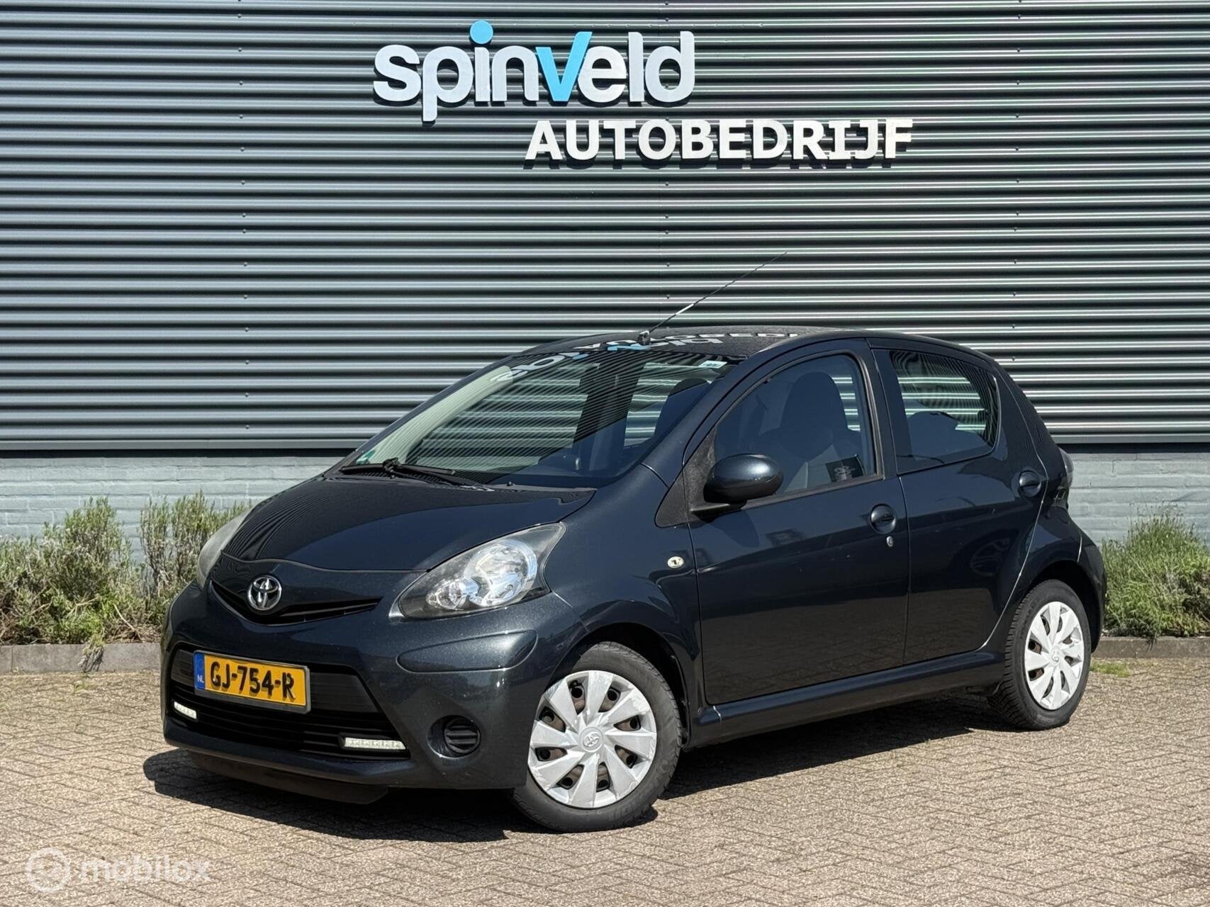 Toyota Aygo 1.0 VVT-i Aspiration - Navi - Airco - 5drs -, Voorwielaandrijving, Euro 5, Gebruikt, 4 stoelen