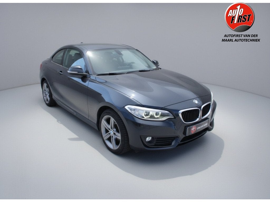 BMW 2 Serie Coupé 218i Cent.Exec. (bj 2016), Auto's, Gebruikt, 4 stoelen, Zwart, Origineel Nederlands
