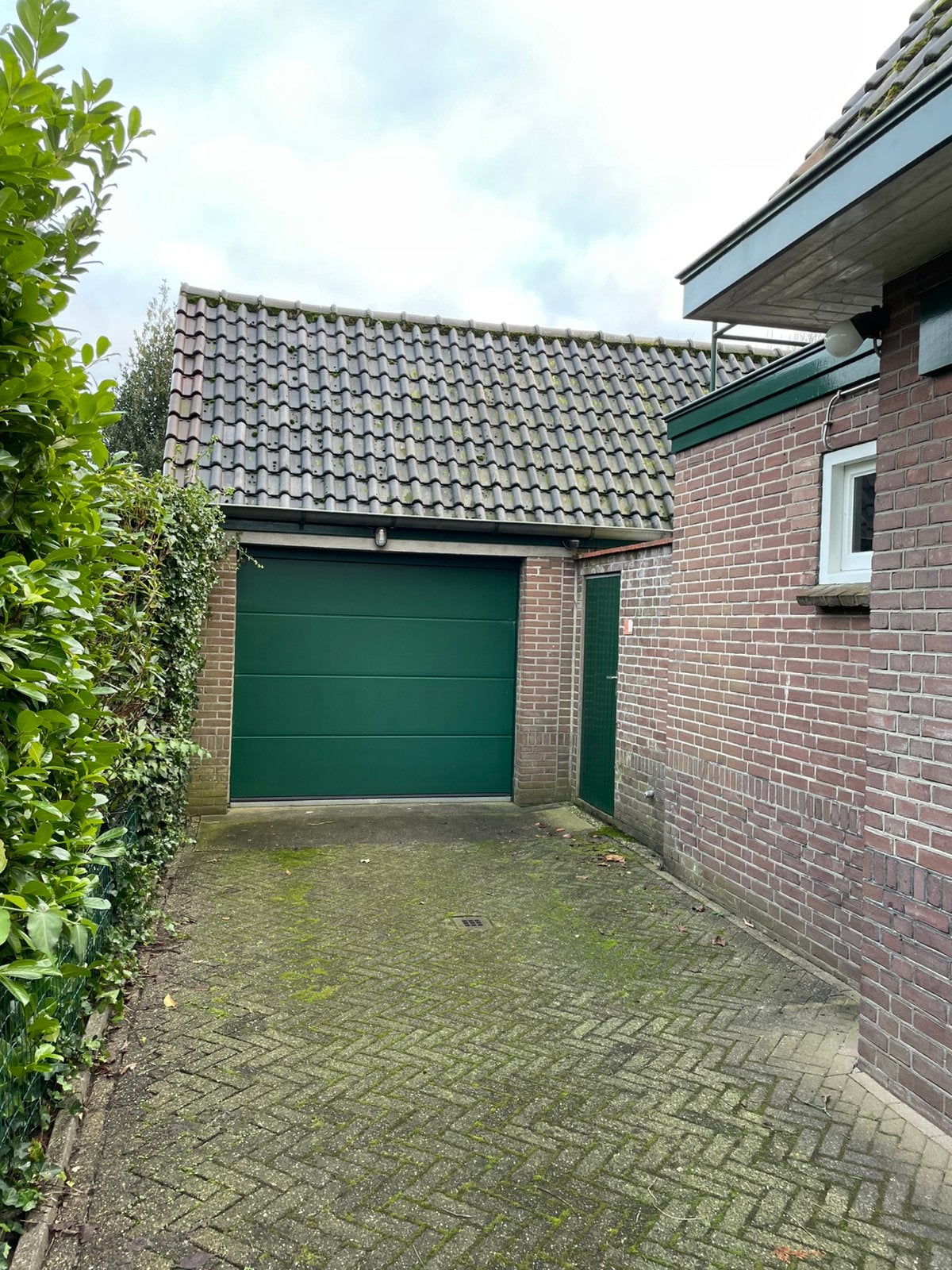 Hormann overhead deur met elektrische aandrijving promatic 3, Ophalen, Garagedeur, Zo goed als nieuw, 120 cm of meer