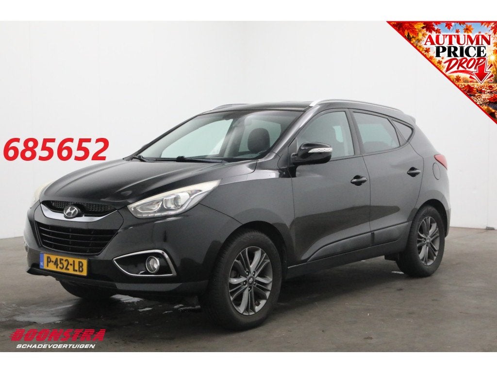 Hyundai ix35 1.6i GDI Business Edition Cruise Clima SHZ Navi, Auto's, Voorwielaandrijving, Euro 5, 4 cilinders, Leder en Stof
