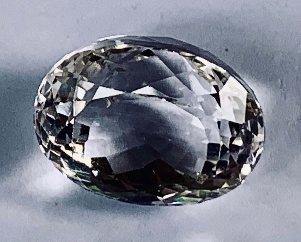 Prachtige doorzichtige topaz edelsteen 21,12crt certificaat, Ophalen, Zo goed als nieuw