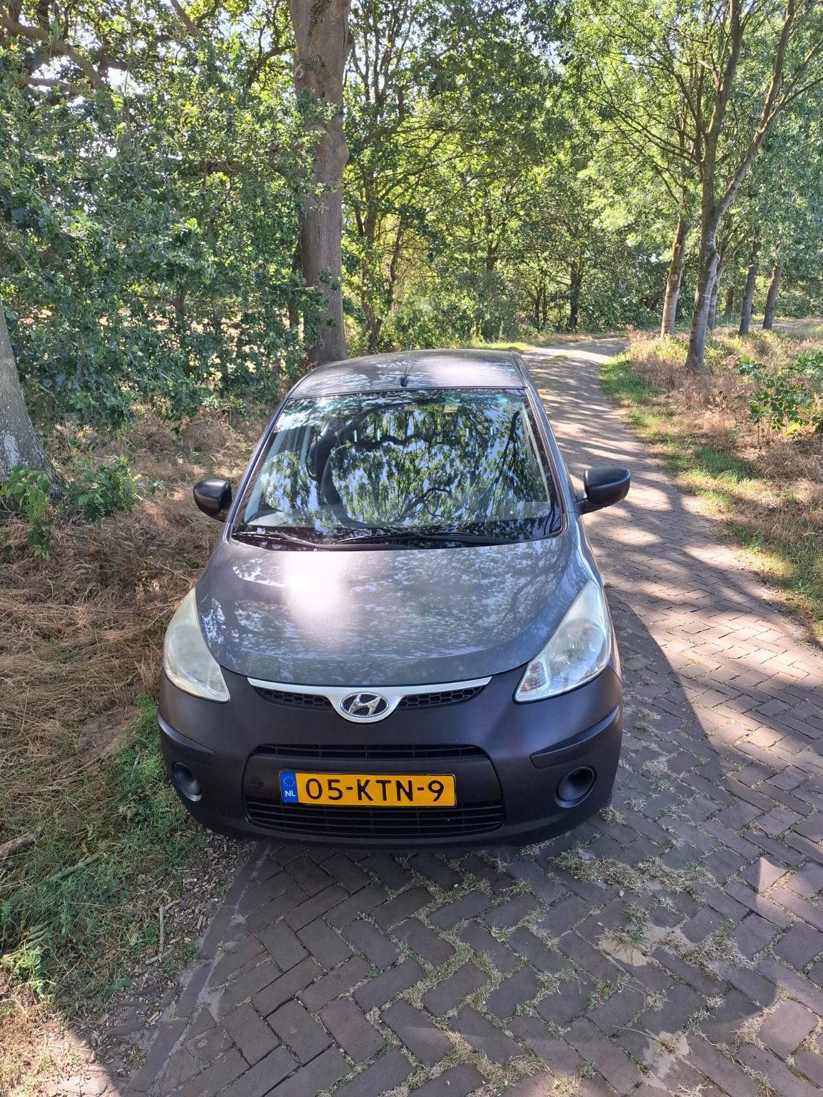 Hyundai i10 1.1 I 5DR 2010 Grijs, Auto's, Voorwielaandrijving, 31 €/maand, 4 cilinders, 400 kg