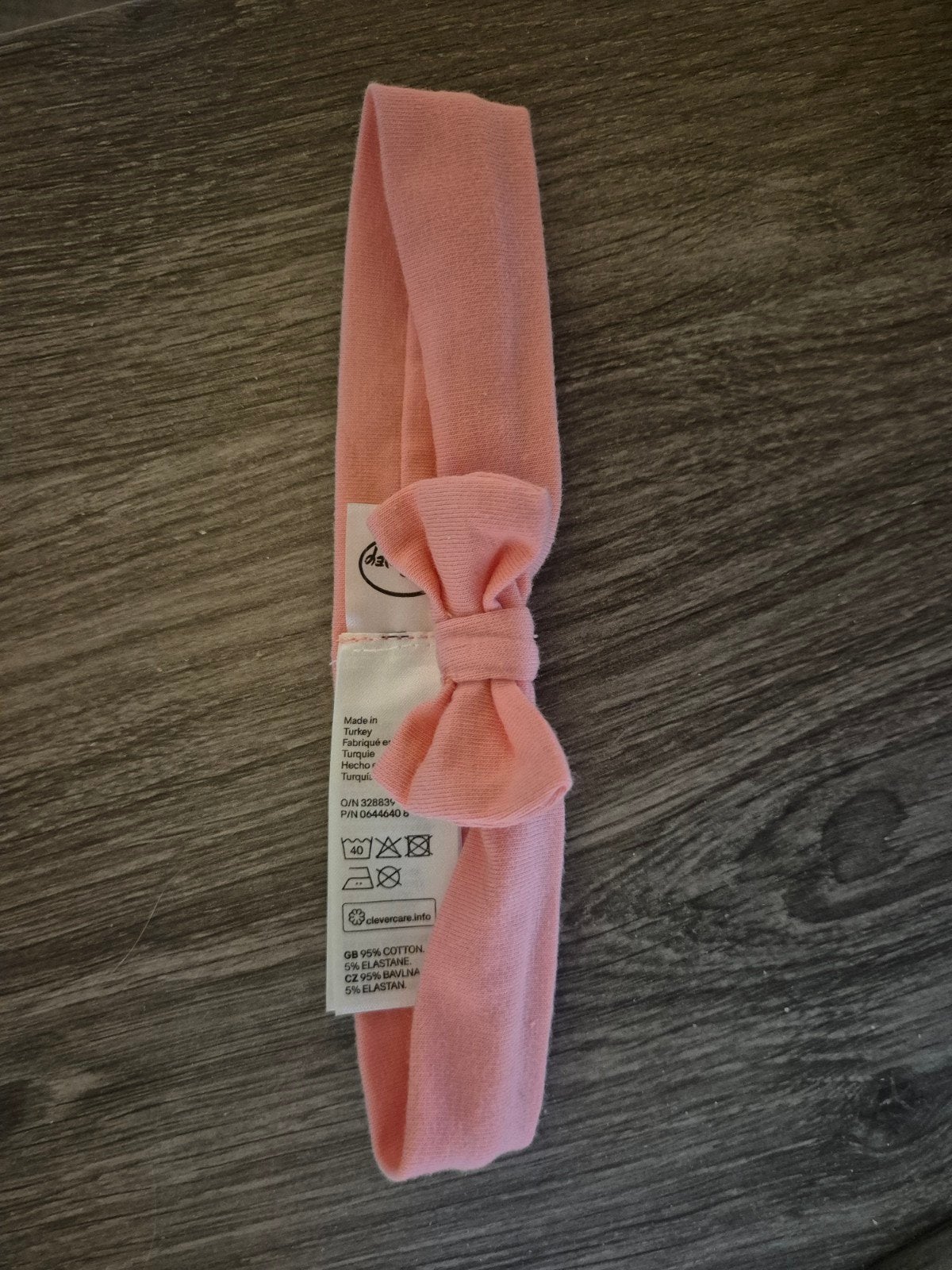 Roze Disney haarband met strik voor baby's, Ophalen of Verzenden, Zo goed als nieuw, Disney