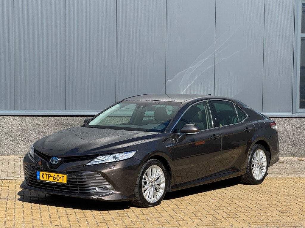 Toyota Camry 2.5 Hybrid Business Intro Leer (bj 2019), 12 maanden, Gebruikt, 4 cilinders, Bedrijf