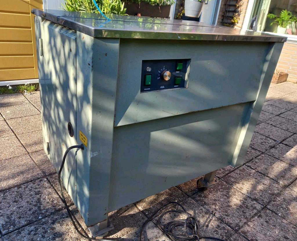 Semi /automatisch bundel/omsnoeringmachine, Ophalen