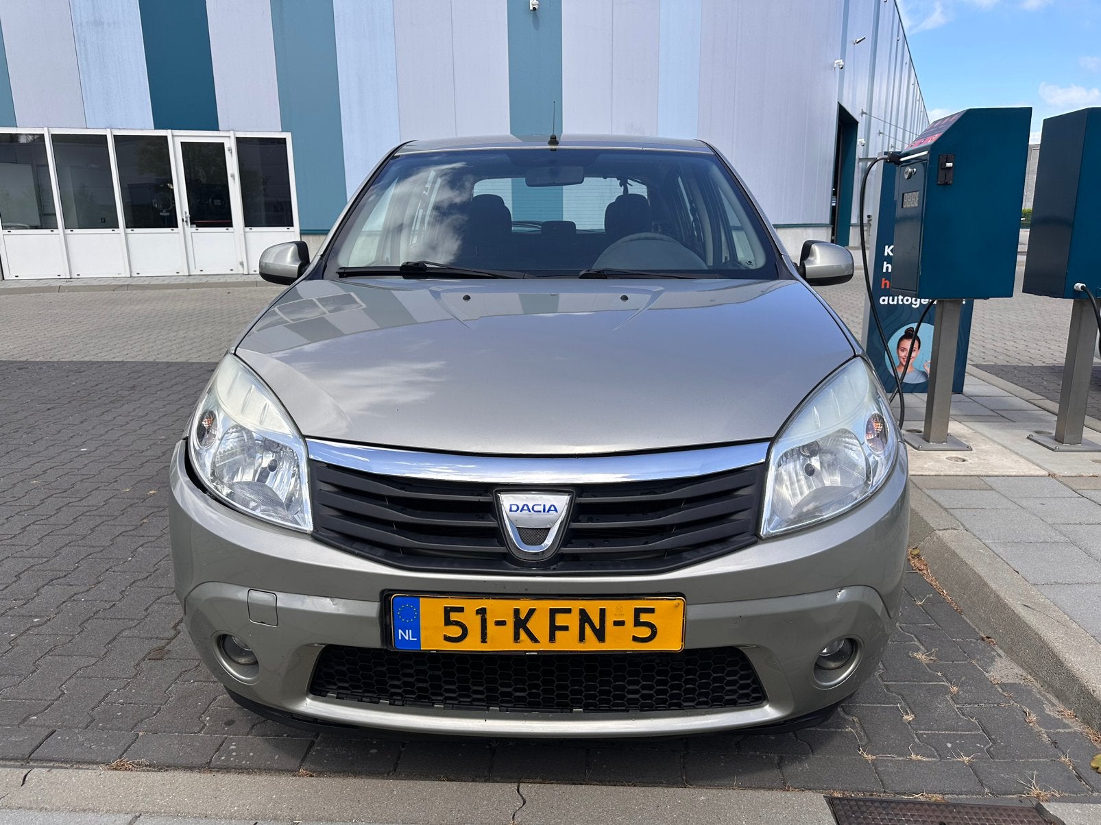 Dacia Sandero 1.2 16V 55KW 2009 Grijs, Auto's, Dacia, Sandero, Benzine, B, Hatchback, Handgeschakeld, Origineel Nederlands, Zilver of Grijs
