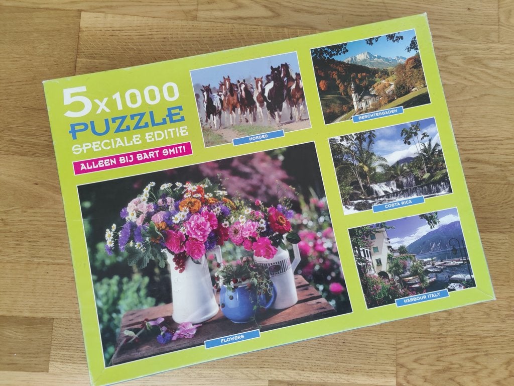 Legpuzzelbox met vijf puzzels, ieder 1000 stukjes, Ophalen of Verzenden, Meer dan 1500 stukjes, Gebruikt, Legpuzzel