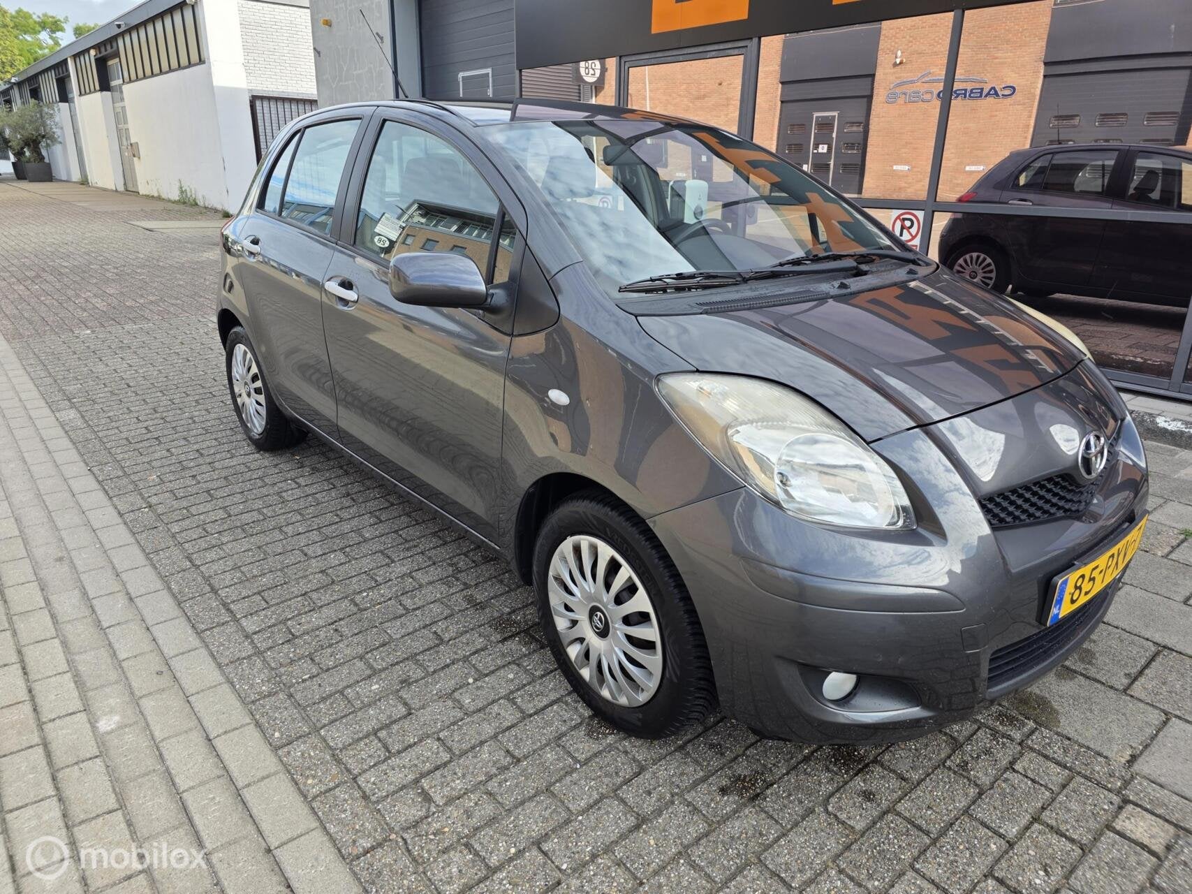 Toyota Yaris 1.3 VVTi Aspiration Automaat, Auto's, Euro 5, 750 kg, 4 cilinders, Automatische klimaatregeling