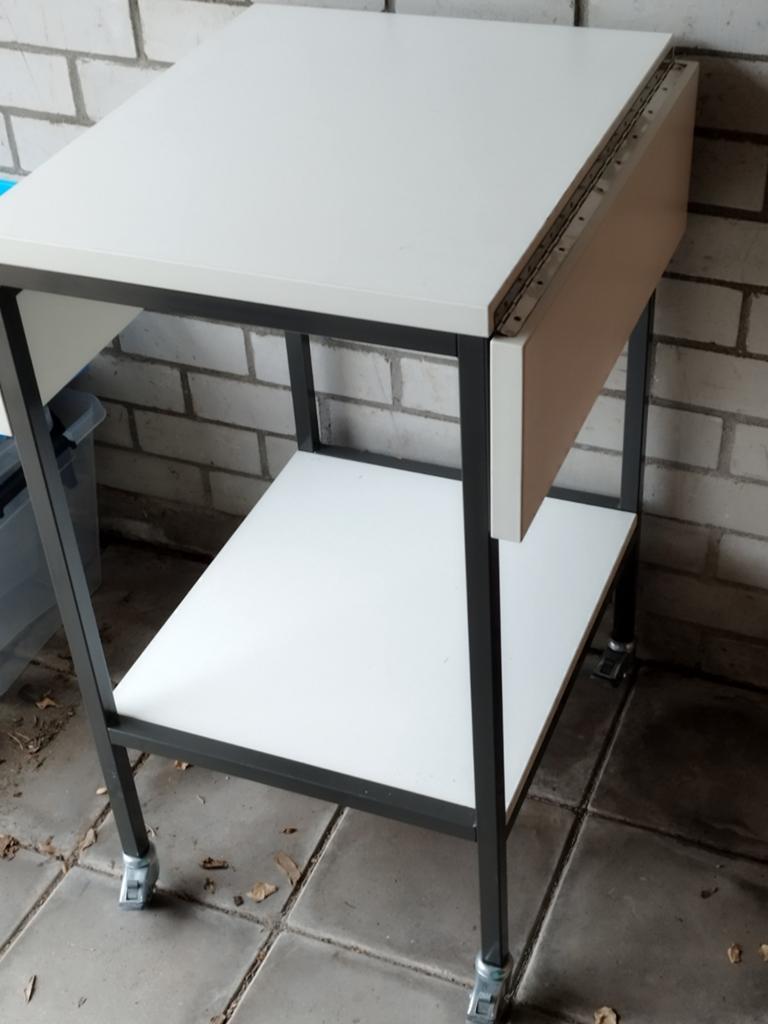 Vouwtafel inpaktafel op wielen, Ophalen