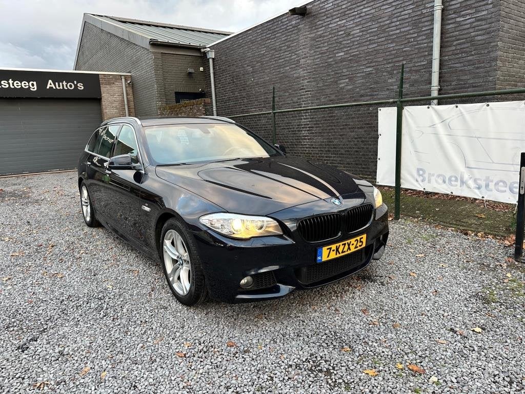 Foto 2 van BMW 5-serie Touring 520i High Executive netteauto/keurigonde