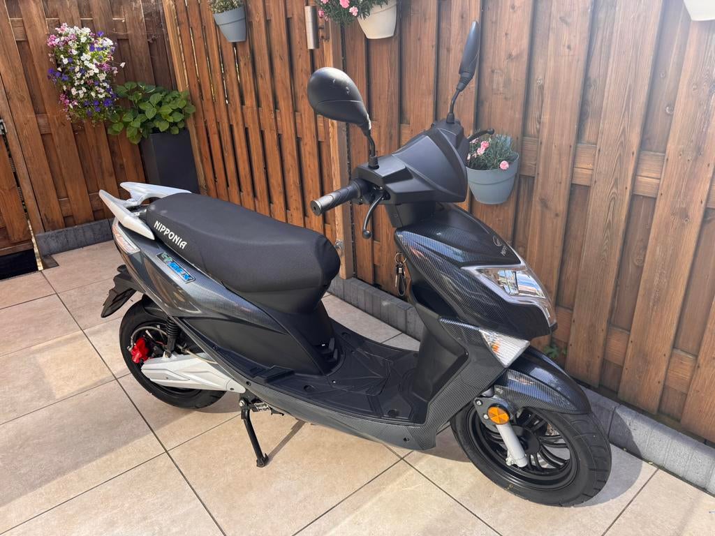 Nipponia E-Rex Carbon (elektriche scooter), Ophalen, Zo goed als nieuw