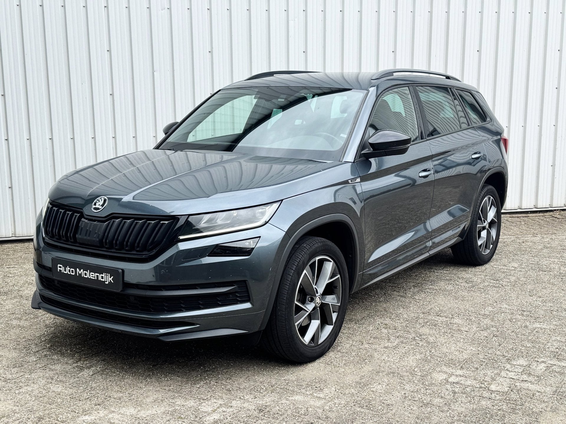 Skoda Kodiaq 1.5 TSI 150 PK DSG Sportline / Camera / Trekhaa, Auto's, Zwart, 4 cilinders, 150 pk, Origineel Nederlands