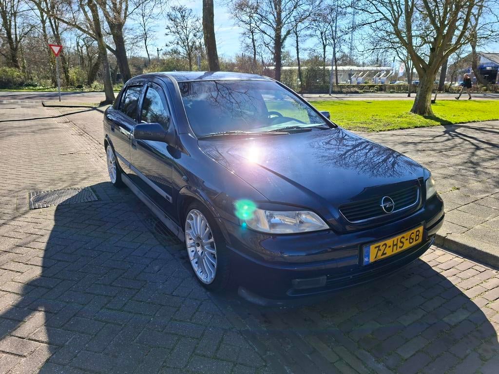 Opel Astra 1.6 16V 5D AUT 2001 Blauw, Zwart, 4 cilinders, Blauw, 49 €/maand
