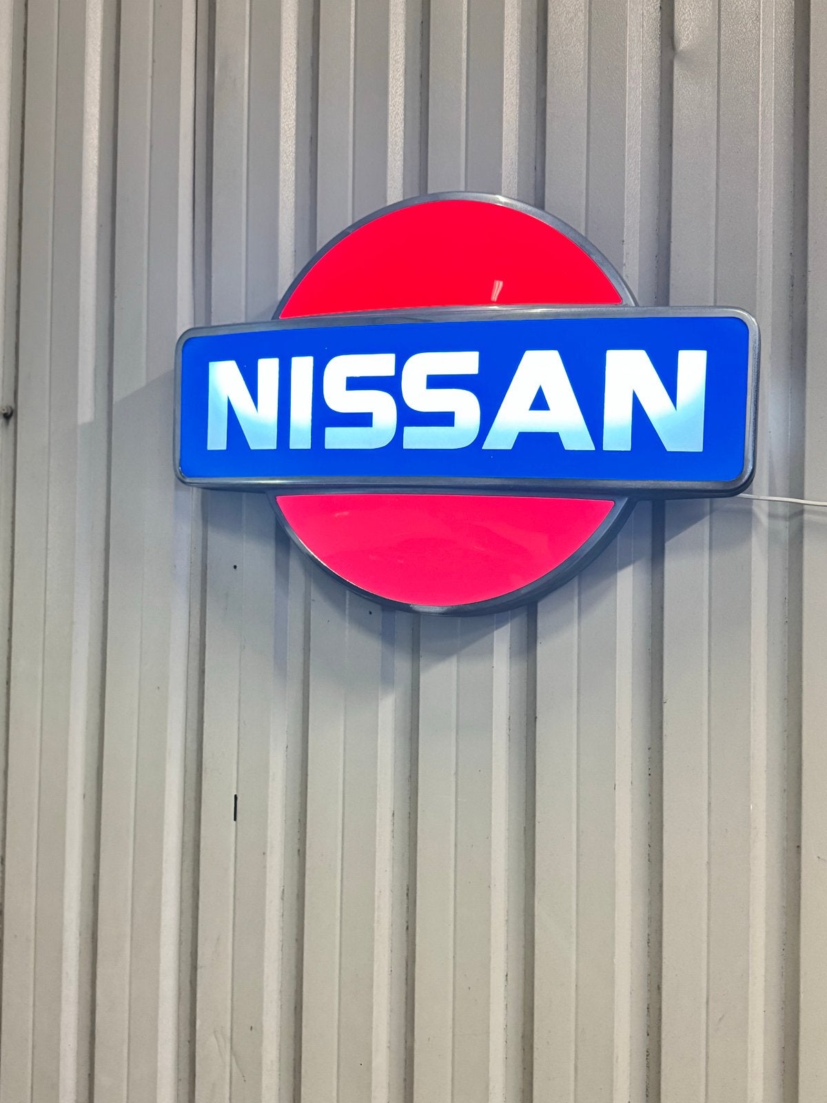 Nissan reclame bord met verlichting, Ophalen of Verzenden, Reclamebord
