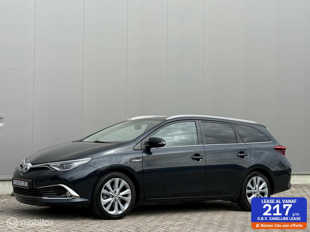 Toyota Auris 1.8 Hybrid Executive Dealer onderhoud - netjes!, Gebruikt, Leder en Stof, Zwart, Hybride Elektrisch/Benzine