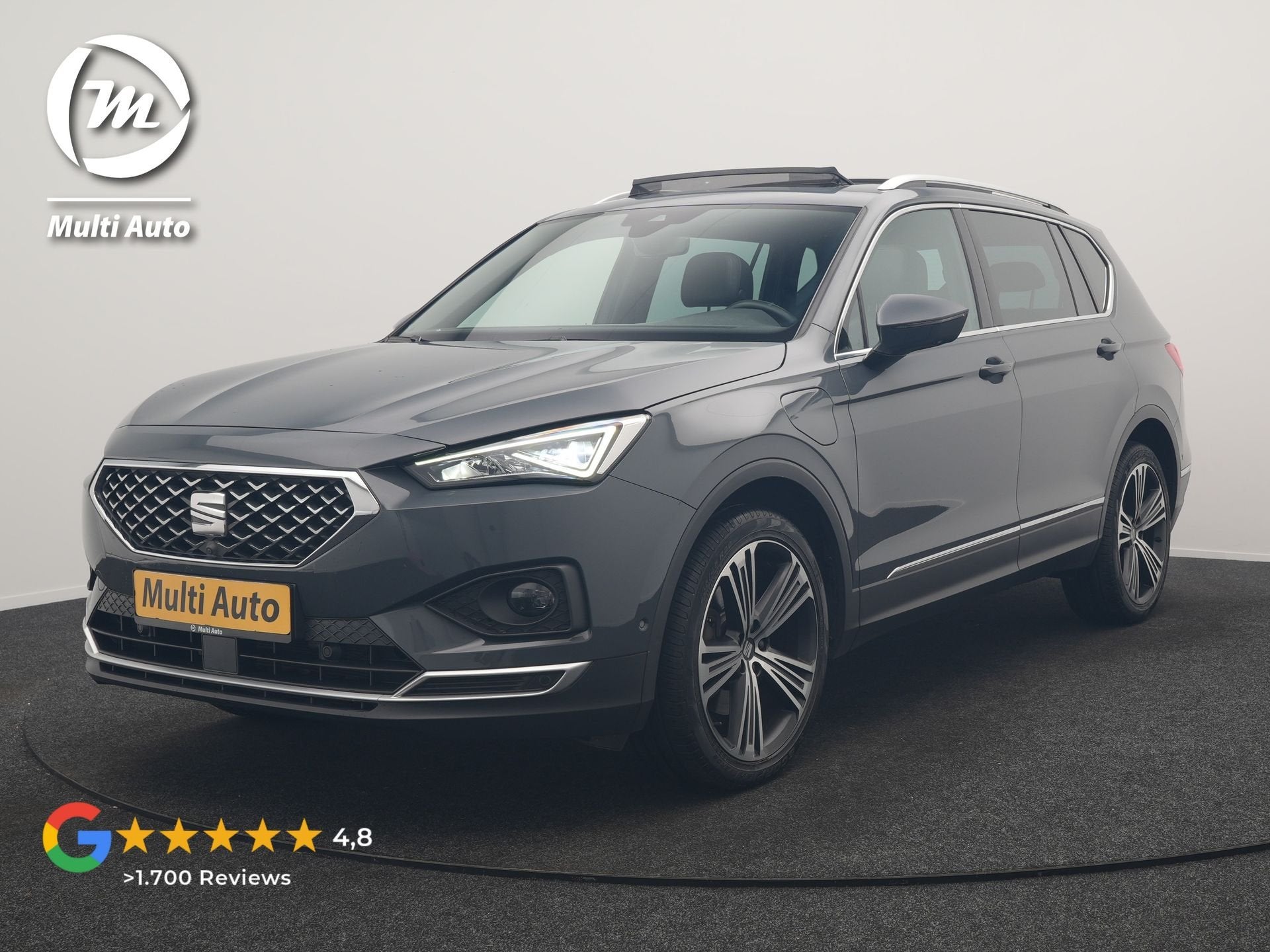SEAT Tarraco 1.4 TSI e-Hybrid Xcellence PHEV 245pk Dealer O., Auto's, Zwart, 4 cilinders, Leder en Stof, Hybride Elektrisch/Benzine